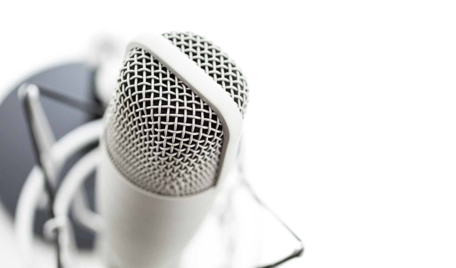 Podcast microphone on white background