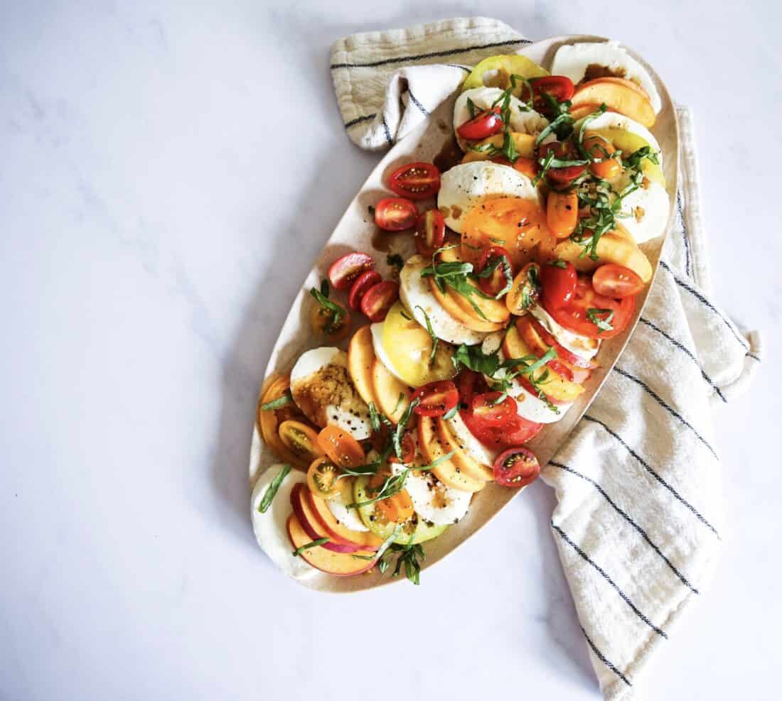 peach cparese salad with tomatoes, mozzarella, and a balsamic glaze
