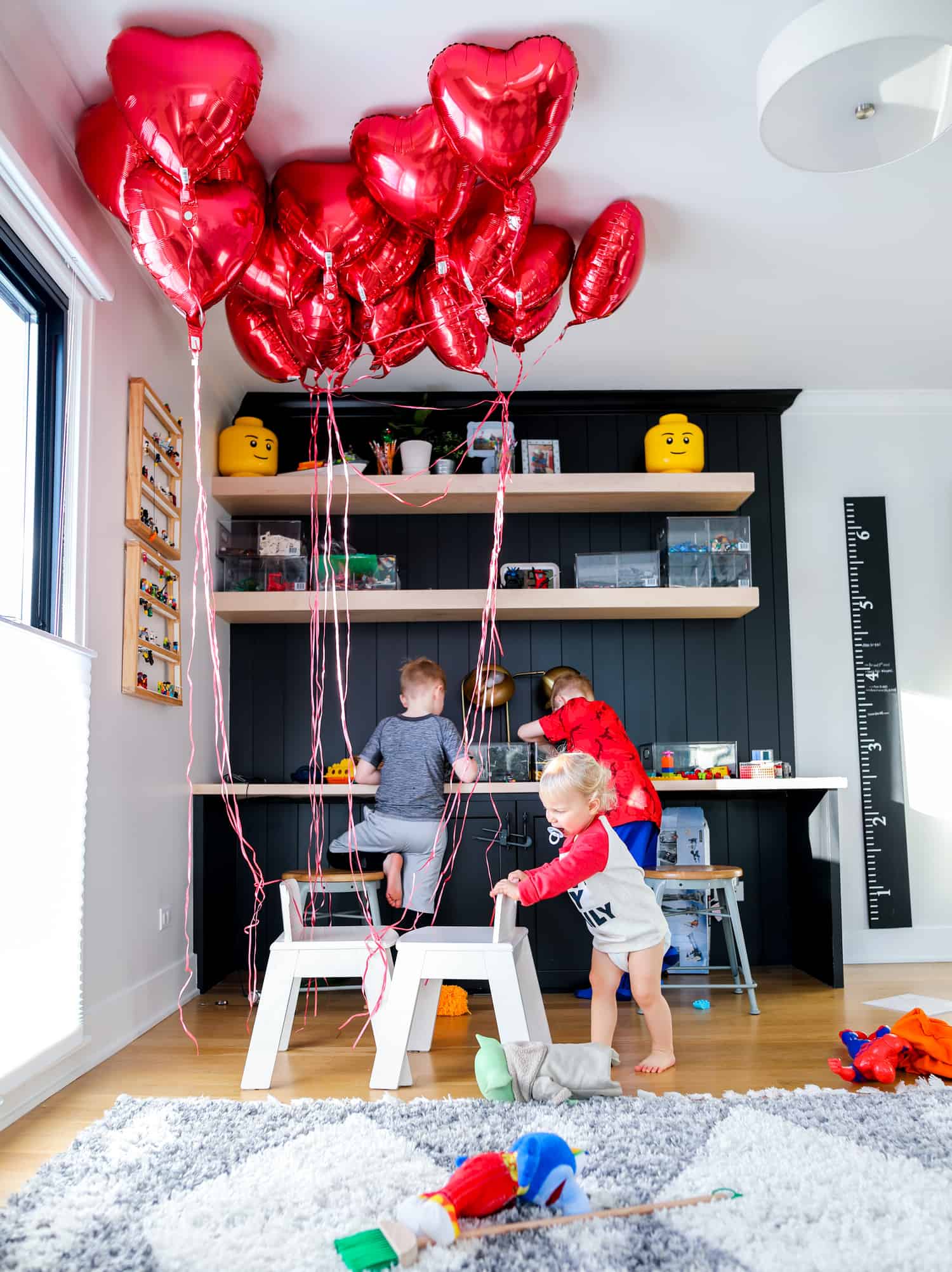 kids with Valentine's Day decorations