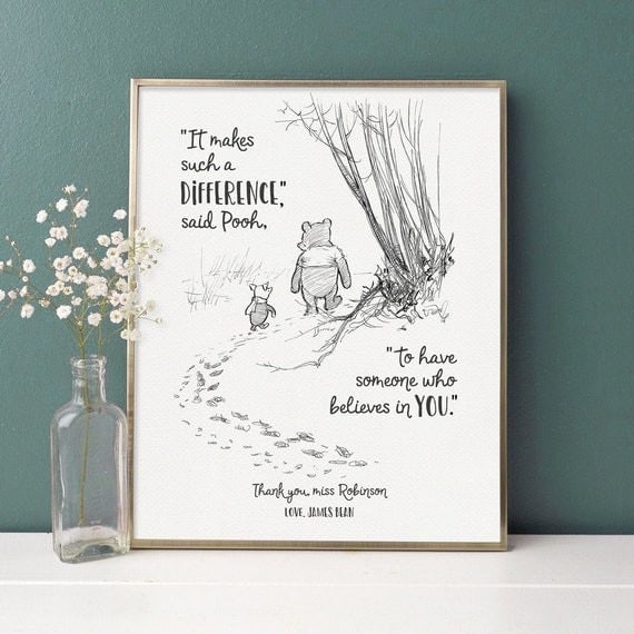 a framed Winnie the Pooh quote and picture