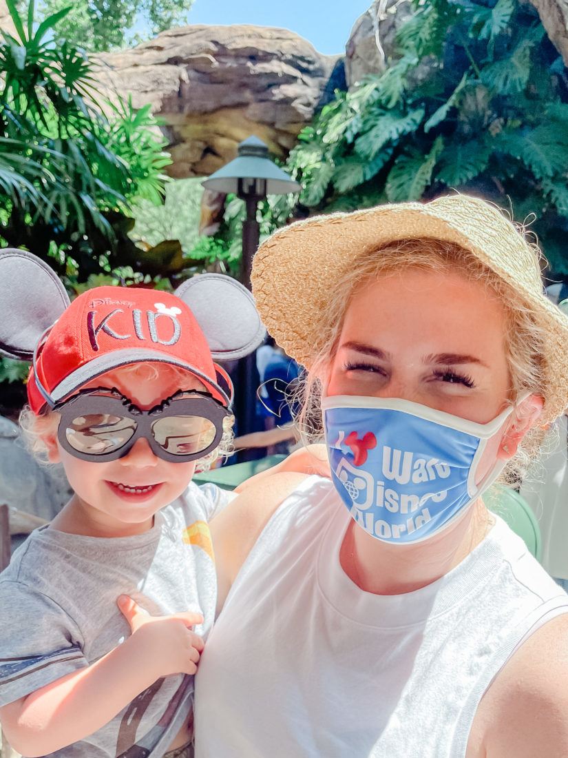 a mom and her son smiling at Disney World 