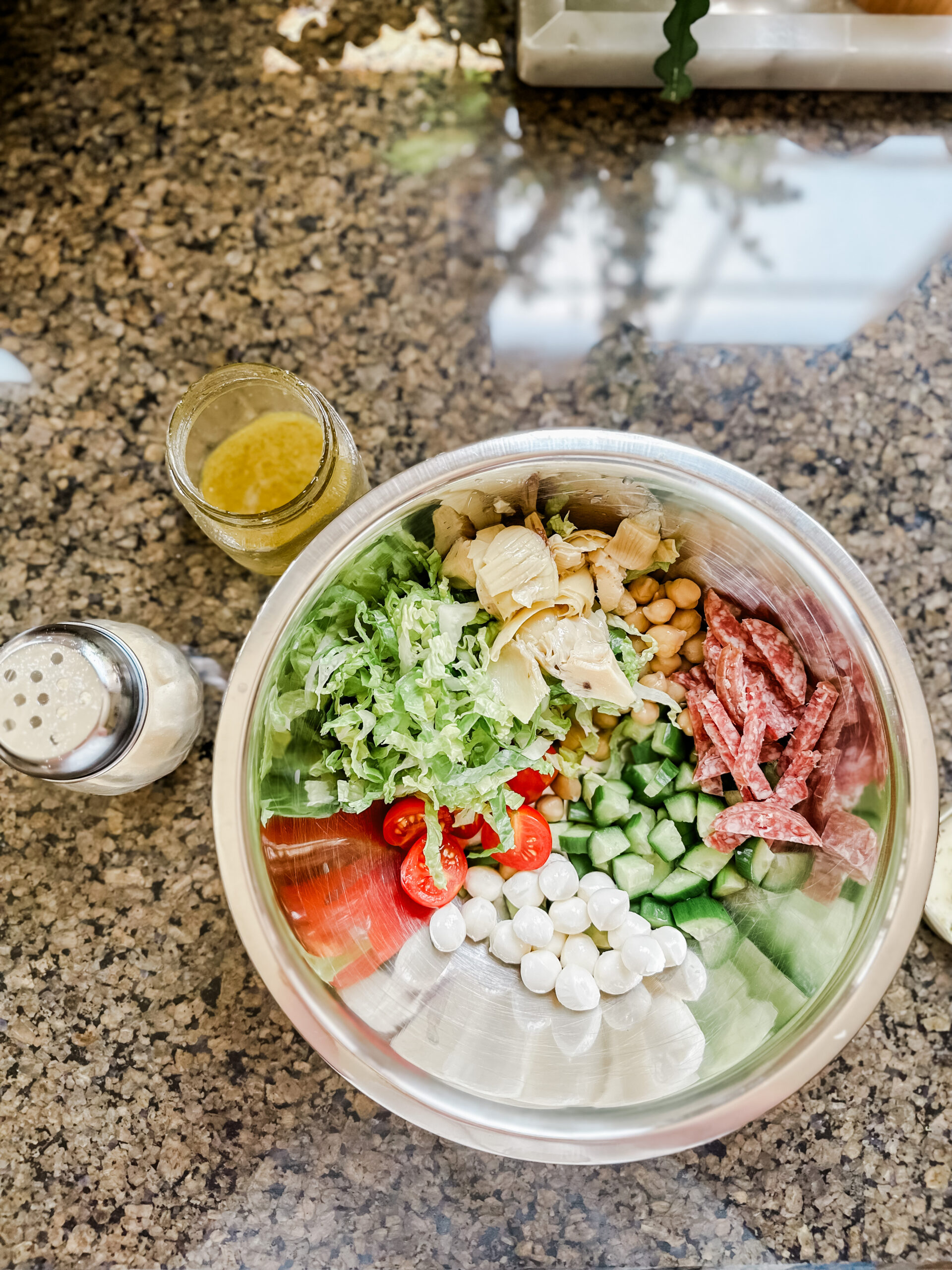 Salad bowl filled with Italian inspired ingredients